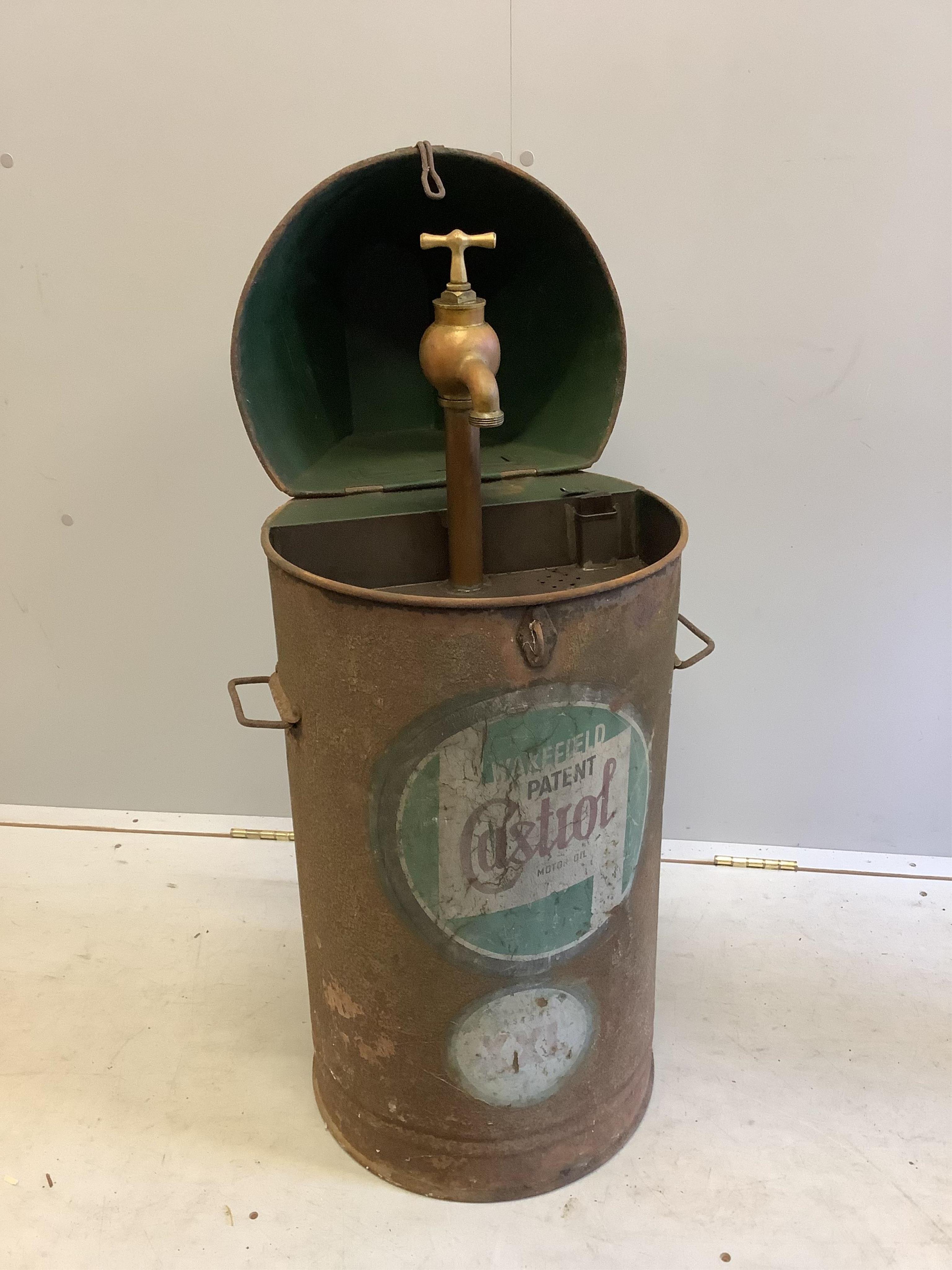 A large vintage Castrol oil dispensing drum, height 88cm. Condition - poor to fair